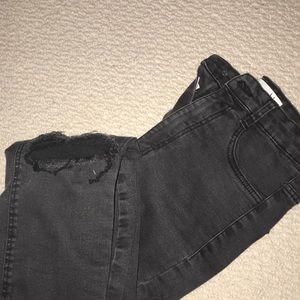 Ripped knee skinny jeans